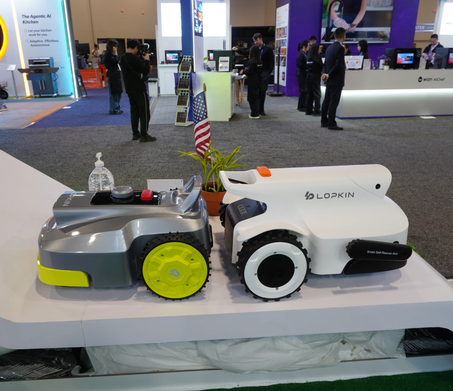 Two LOPKIN robotic lawn mowers presented at an exhibition