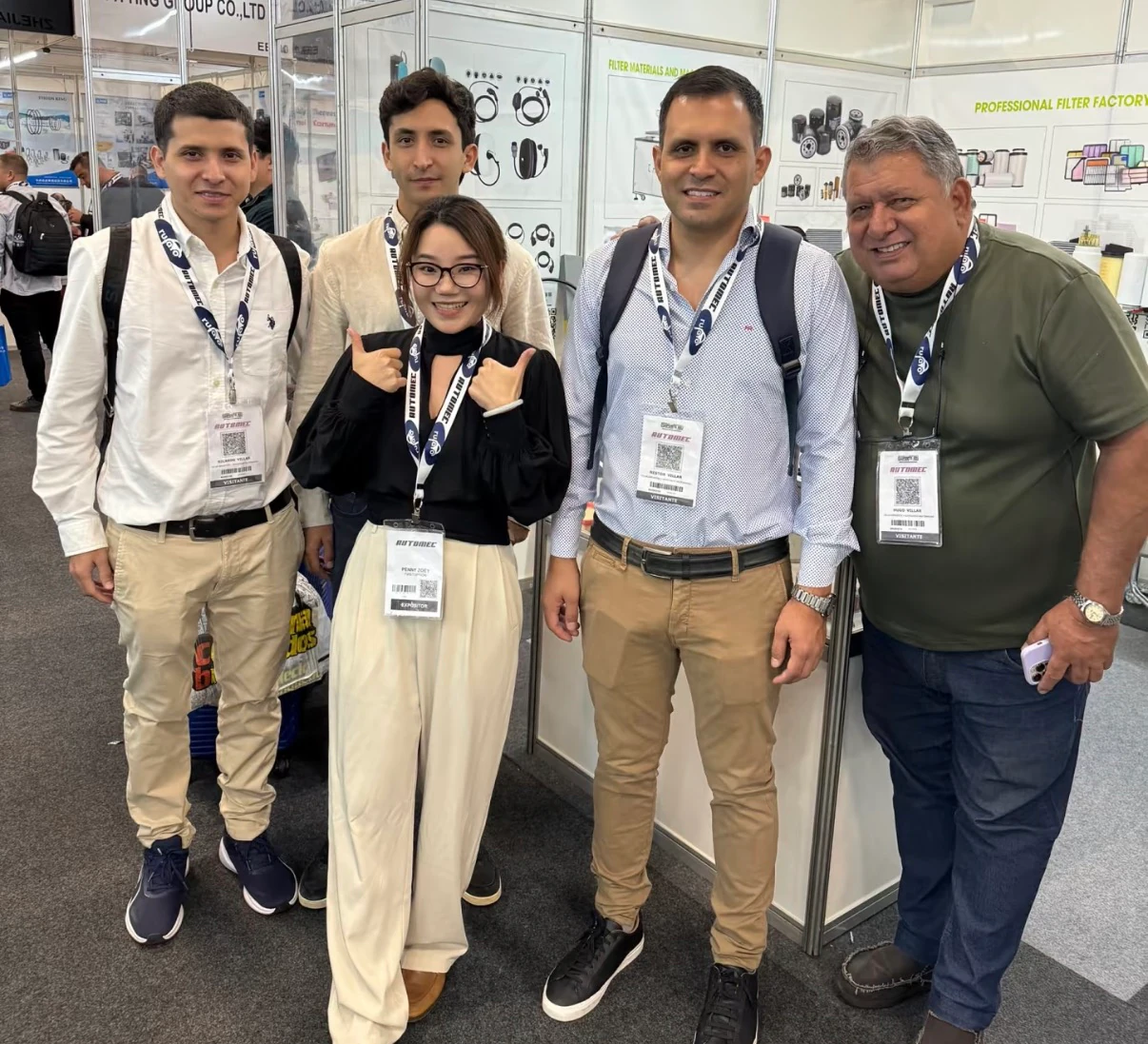 Yuwuzhi team pictured with international business contacts at an industry exhibition